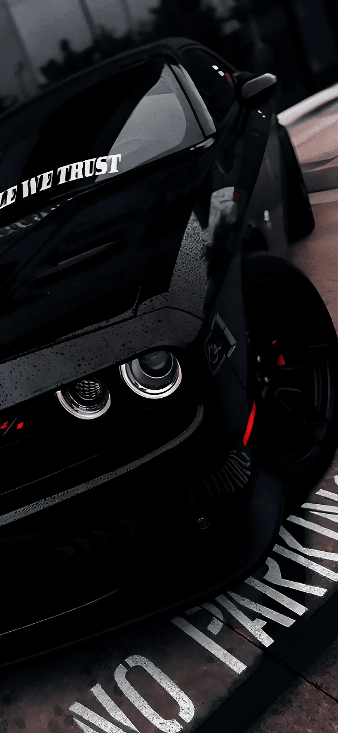 Dodge Challenger muscle car with glossy finish on a dark background, highlighting curves and headlights