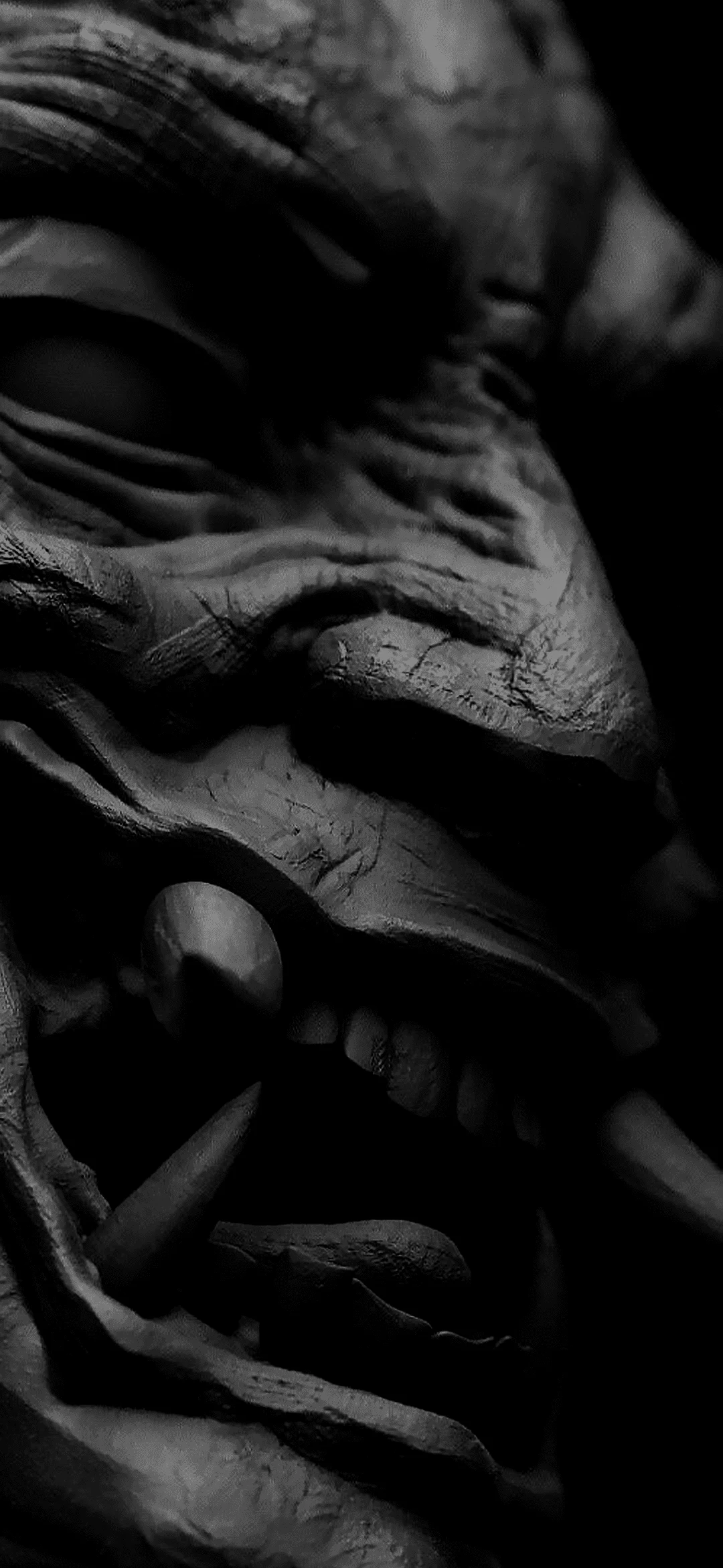 Japanese black mask with intricate patterns and mysterious look on a clean background